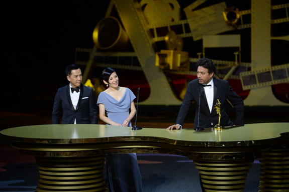 Irrfan Khan, lead actor of The Lunchbox, receives the Best Actor award from Donnie Yen and Sandra Ng